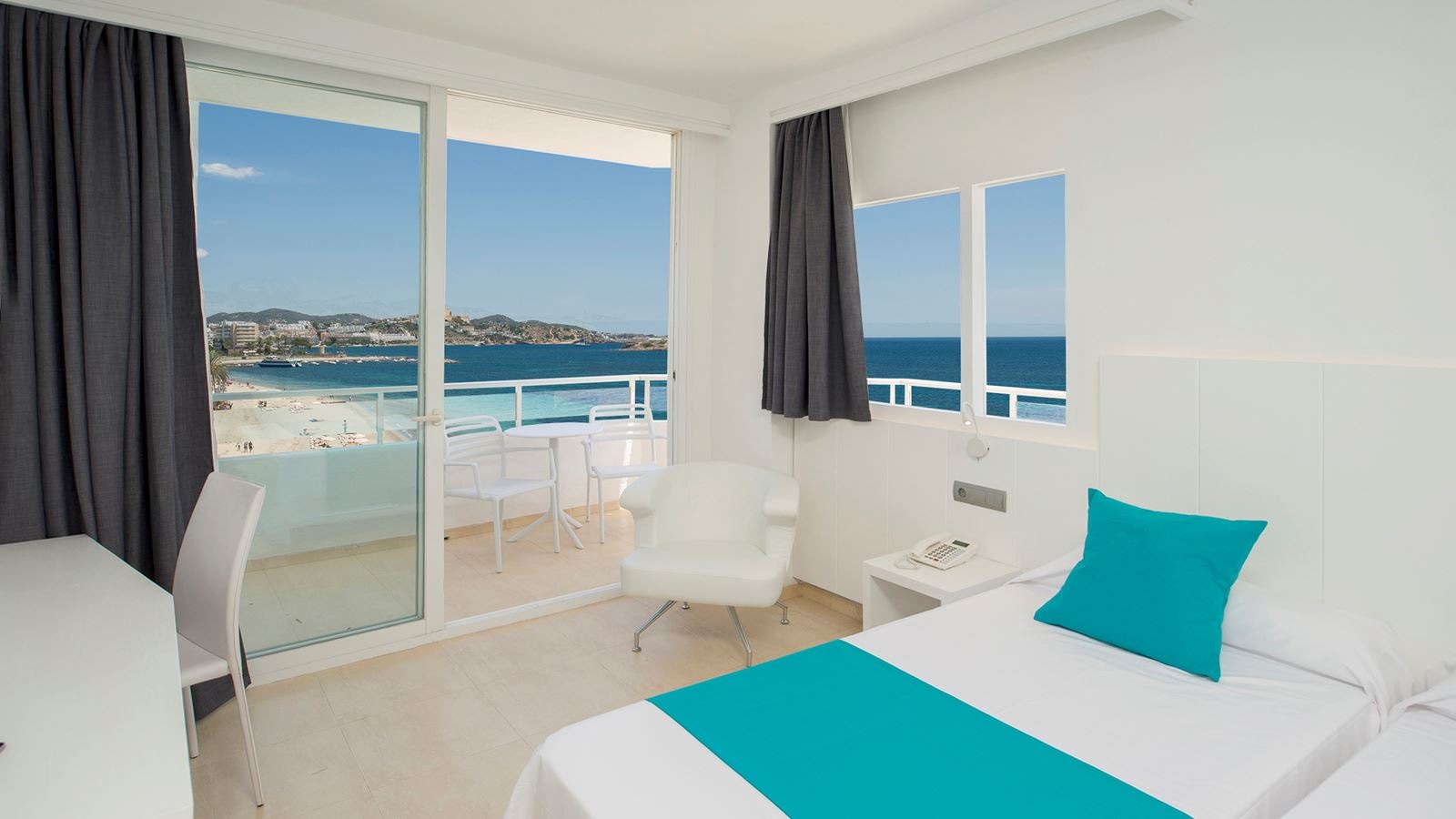 rooms-twin-room-lateral-sea-view-balcony-or-terrace